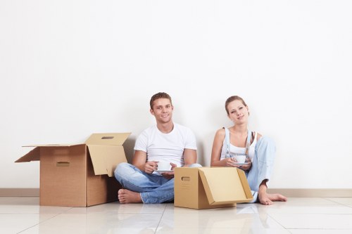 Mover transporting furniture with careful packing