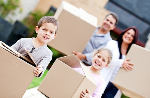 Packing and moving belongings with careful handling and protection