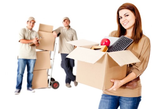 Moving team loading boxes and furniture carefully for a Marylebone job