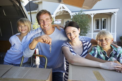 Professional movers handling office furniture in central Marylebone